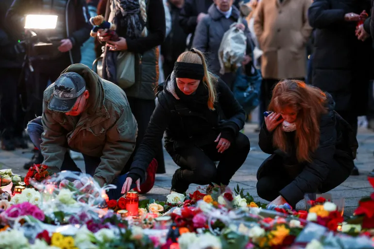 Germans mourn: five people killed, 200 injured in Christmas market attack